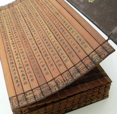 an ancient bamboo scroll with chinese writing on them