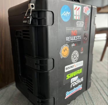 a road case with stickers on it