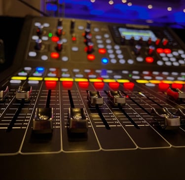a sound mixing console with a sound board
