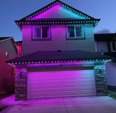 CalgaryHousePermanentLEDLightsInstalledbyDiamondBrightIncinPurpleandGreen