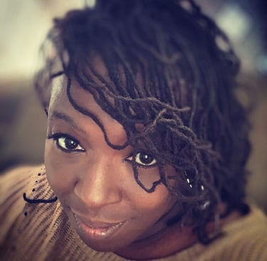 Picture of the founder and CEO locking directly into the lens of the camera