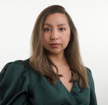 a woman with a green blouse and a white background