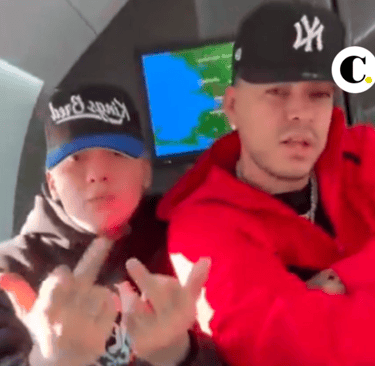 Indignant singers Fied and Ryan Castro flip off camera in a private jet