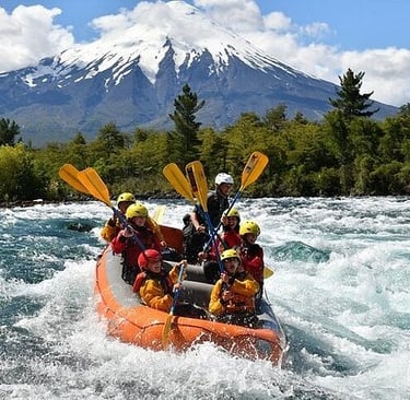 a group of people on raft raft rafting down a river in chile