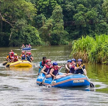 a group of people on raft raft rafting down a river in sri lanka