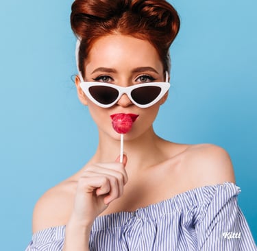 a woman with sunglasses and sunglasses on a blue background