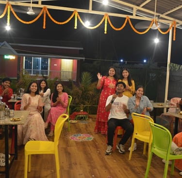 Guests at Nature’s Trinket Karjat singing karaoke.