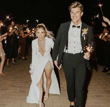 Couple laughing and enjoying wedding