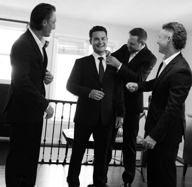 Groom getting ready with friends