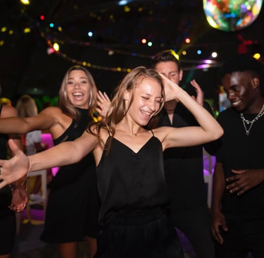 Group posing in 360 slow-motion video booth at Bakersfield birthday party