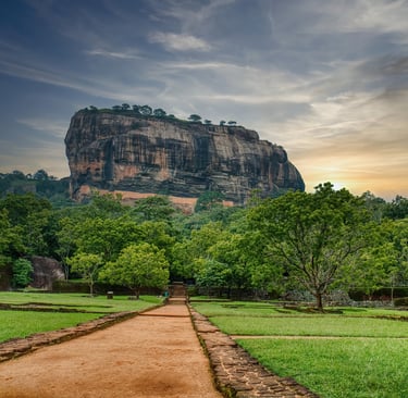 a path leading to a large rock formation