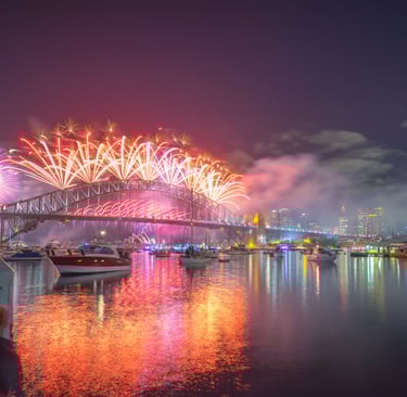 a bridge bridge with fireworks in the background