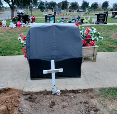 A headstone covered and ready for unveiling