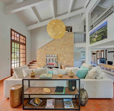 a living room with a couch and a table