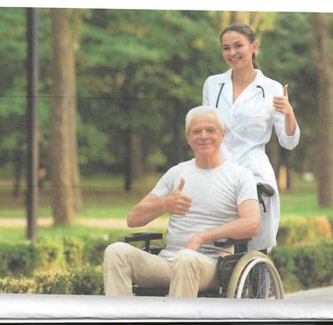 a nurse and a patient in a wheelchair