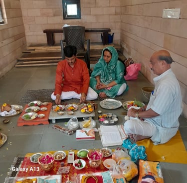 Young yajaman couple performing Matrugaya Pooja with Pandit Daxesh and complete samagri at Bindu Sarovar Siddhpur