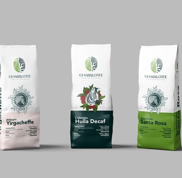 three bags of coffee beans and a bag of coffee