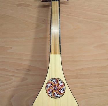 Long scale gittern with 3 piece rose and Ebony binding