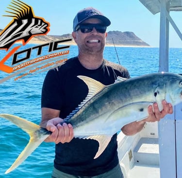 a man holding a fish fish on a boat