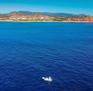 a boat in the middle of a body of water