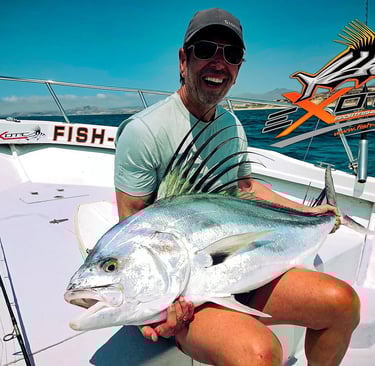 a man holding a fish on a boat