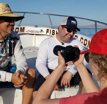 a group of people on a boat in the ocean