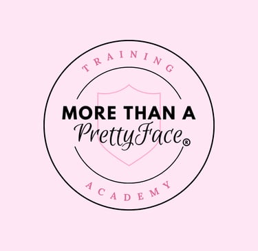 More Than A Pretty Face Training Academy circular logo with pink shield and black text on a light pink background.