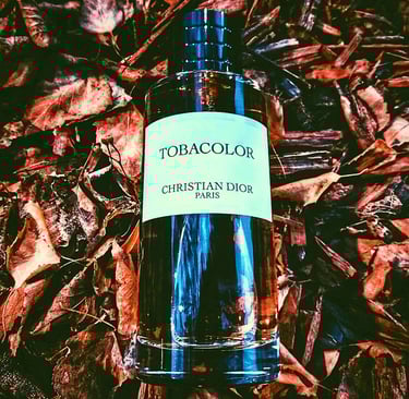 Dior Tobacolor bottle on tobacco leaves