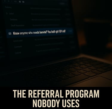 a laptop computer with the words the referral program