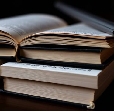close-up of books side view lying on a table.