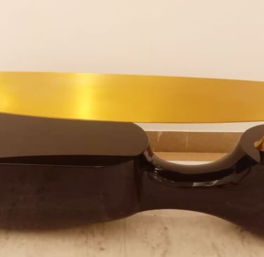 a table with a gold leaf on it