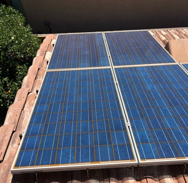 Solar panels with bird proofing mesh installed in Phoenix AZ to prevent pigeons from nesting under