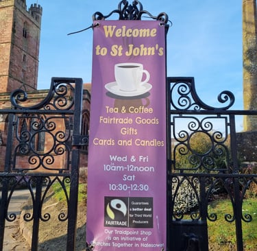 Banner showing Traidpoint fairtrade goods and cafe.