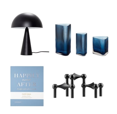 Modern home decor set featuring a black dome lamp, blue fluted glass vases, and a modular candle holder.