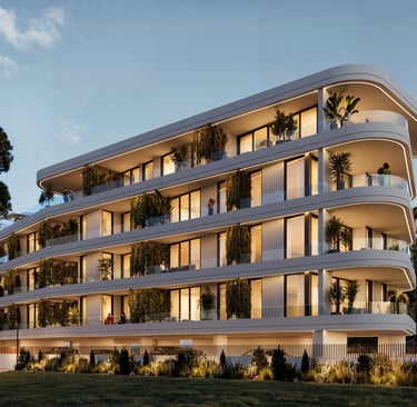 Evening view of Lev Limassol contemporary building with warm exterior lighting