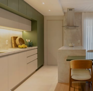 a kitchen with a table and chairs in the middle of the room