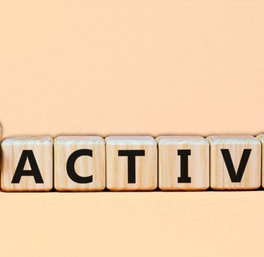wooden blocks with the word changing from reactive to proactive