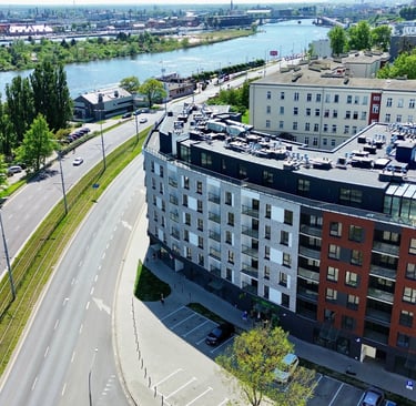 Nowoczesny apartamentowiec nad rzeką w Szczecinie – apartamenty na sprzedaż z widokiem na wodę