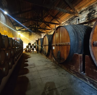 a bunch of barrels stacked on top of each other