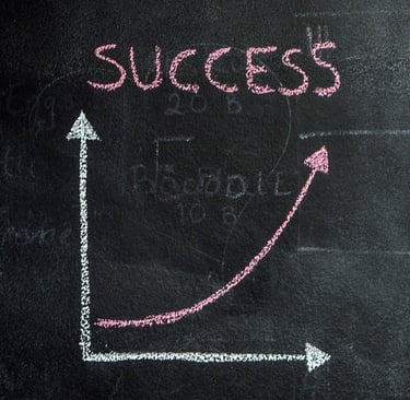 horizontal-and-vertical-axes-drawn-on-a-chalkboard-