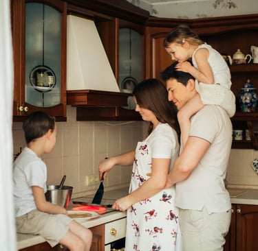 Family enjoying kitchen remodel by Portugal Woodworks in Park City and Heber, Utah