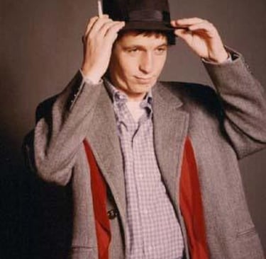rino gaetano indossa il suo cappello
