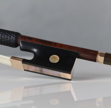 Rehair on gold-mounted modern Paris violin bow