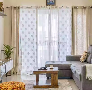 a living room with a couch and a television