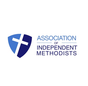 Association of Independent Methodists logo featuring a blue shield and white cross.