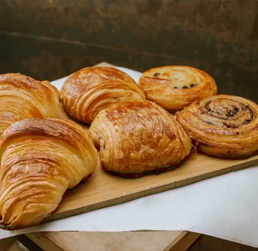 Fresh croissants and French pastries in Paris bakery display