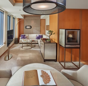 Luxury hotel room in Tokyo with floor-to-ceiling windows overlooking city