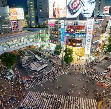 Aerial view of Shibuya Crossing Tokyo with massive crowds crossing intersection