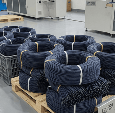 Precision cutting machine slicing a navy blue braided paper rope, by Hanxia Factory