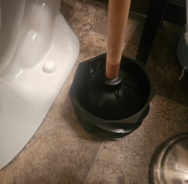 Helix Basin Black on bathroom floor.